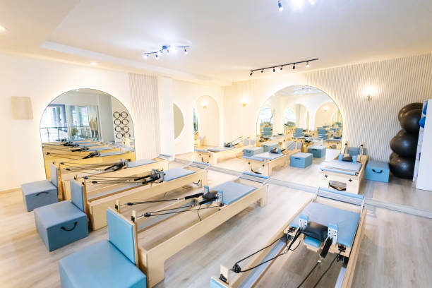 Modern Pilates studio without people with big mirrors